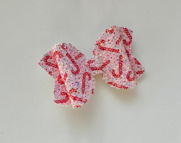 Scalloped Edge Pink Glitter Candy Cane Christmas Bow